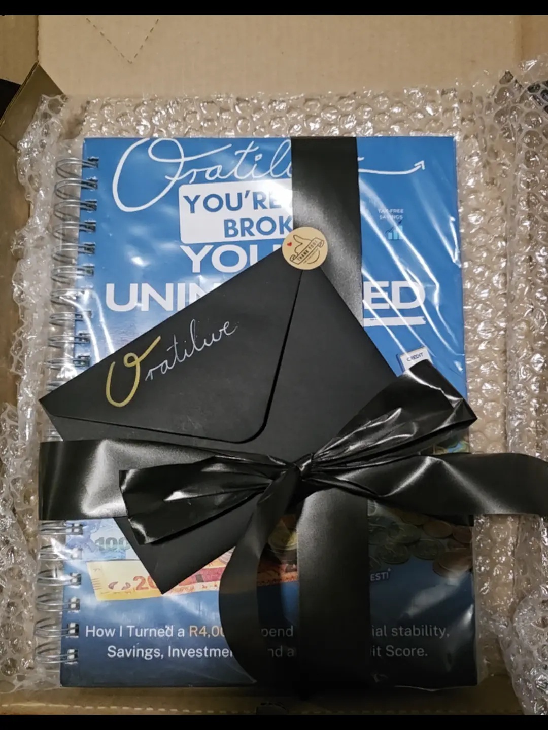 An image of the book that's wrapped and personalised for shipping.